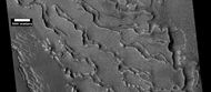 Small and large cracks, as seen by HiRISE under HiWish program The small cracks to the left will enlarge to become much larger dues to sublimation of ground ice. A crack exposes more surface area, hence greatly increases sublimation in the thin Martian air.