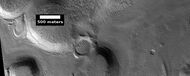Mantle layers, as seen by HiRISE under HiWish program Mantle layers seem to be forming a group of dipping layers.