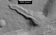 Layered deposit in Mamers Valles, as seen by HiRISE.