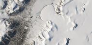 Romer Lake's Elephant Foot Glacier in the Earth's Arctic, as seen by Landsat 8. This picture shows several glaciers that have the same shape as many features on Mars that are believed to also be glaciers.