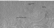 Close-up of lobate debris apron from the previous CTX image of a mesa. Image shows open-cell brain terrain and closed-cell brain terrain, which is more common. Open-cell brain terrain is thought to hold a core of ice. Image is from HiRISE under HiWish program.