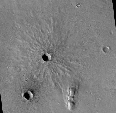 Fresh crater with well-defined ejecta. This image was named HiRISE picture of the day for October 15, 2021.
