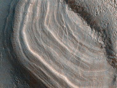 Close view of dipping layers Each layer was deposited when the climate changed. These layers only appear in protected areas.