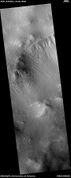 Wide view of a gully on a steep slope, as seen by HiRISE under HiWish program