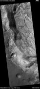 Wide view of cracked surface and collapse depressions, as seen by HiRISE under HiWish program