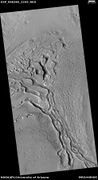 Wide view of terrain caused by ice leaving the ground, as seen by HiRISE under HiWish program