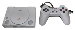A PlayStation Classic console and controller against a pure white background.